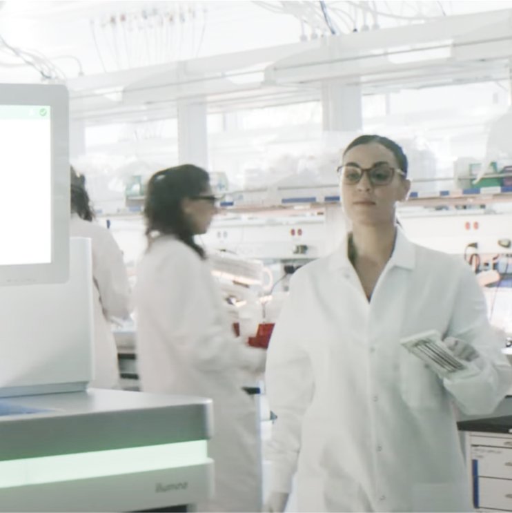 NovaSeq 6000Dx in lab with scientist